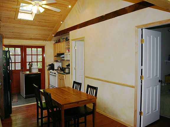 Dining/Kitchen - bedroom doors on right