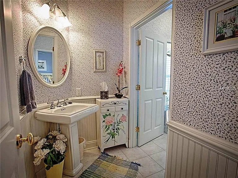 This is the entrance to the guest bath, overlooking the wrap around porch and front yard.
