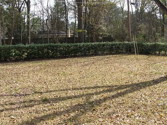 Spacious backyard w/room to play or grow a garden. 