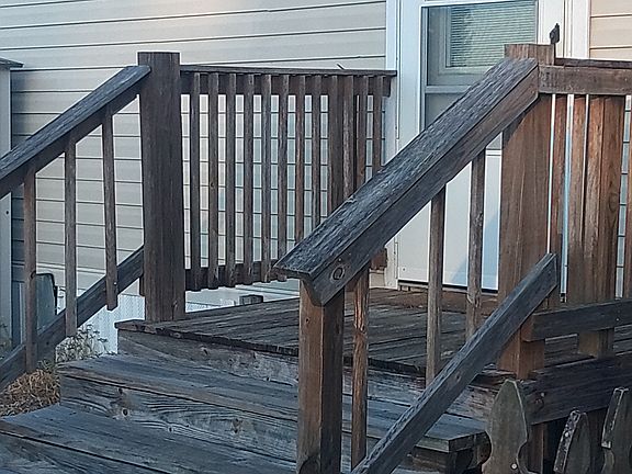 West stairs into laundry/mud room
