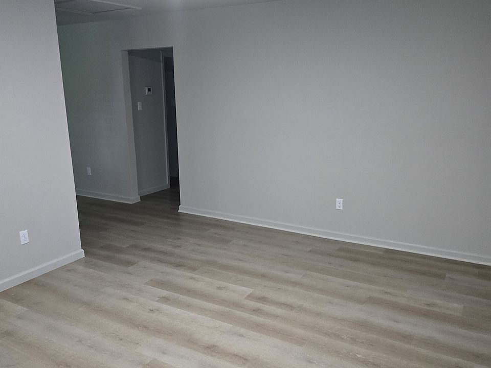 Living room view to hallway, new flooring, lighting, new HVAC
