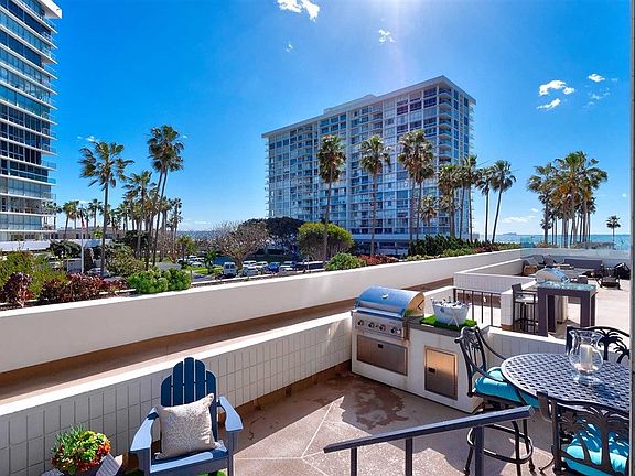 Wonderful ocean breezes and view on the terrace.  Built in BBQ is convenient and great for easy dinners and entertaining.