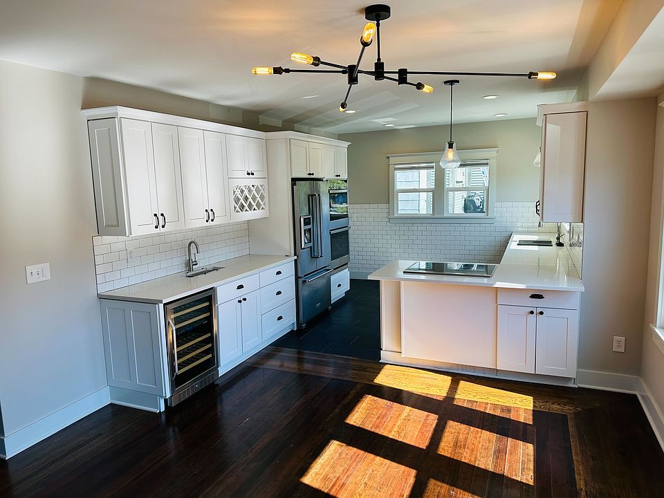 Open kitchen into dining space and living room