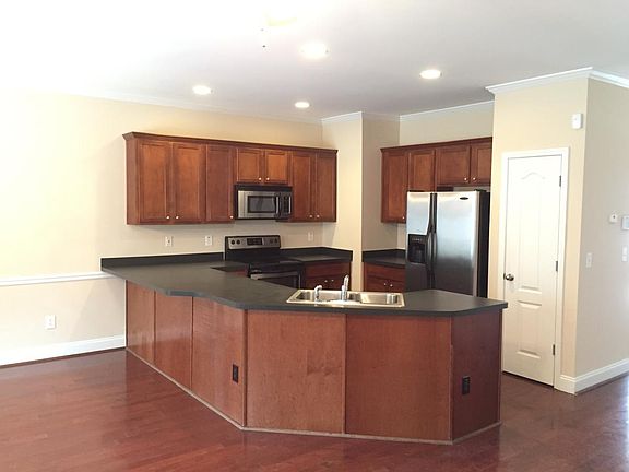 Upgraded Kitchen overlooks Living Space