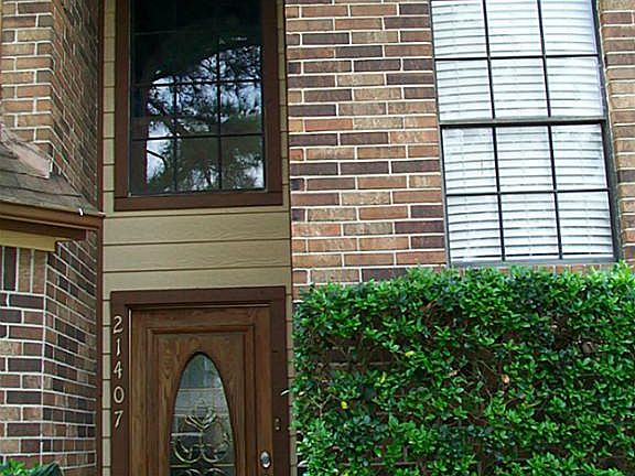 COVERED ENTRY WITH BEVELED GLASS DOOR