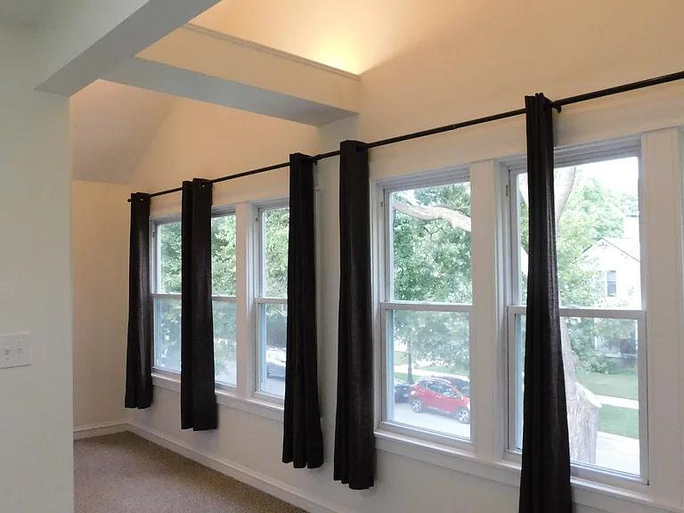 Main bedroom. Has nook outside main bathroom for storage or a small desk.
