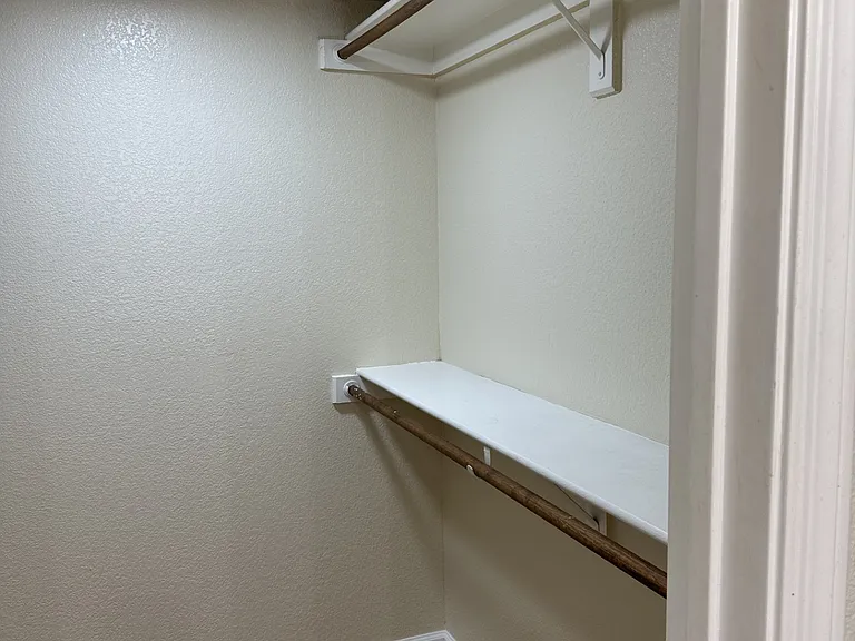 primary bedroom walk in closet
