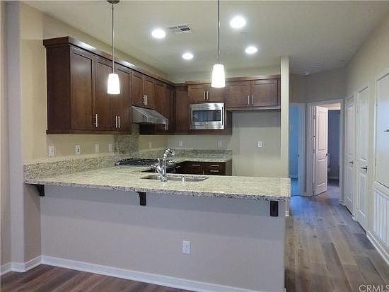 2nd image of 1512 W Artesia Sq APT D