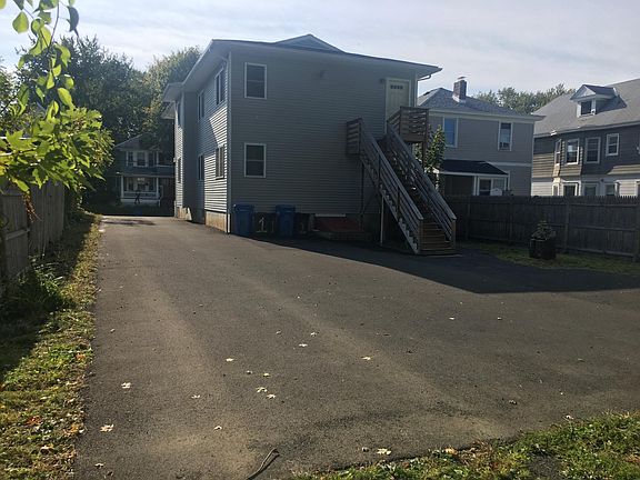 View from the backyard and parking area.