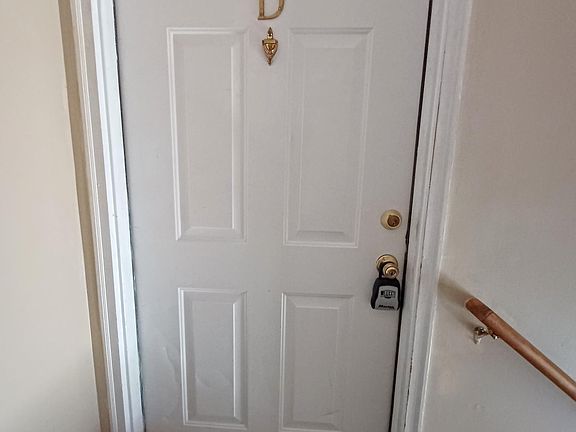 Unit D is at the top of the stairs