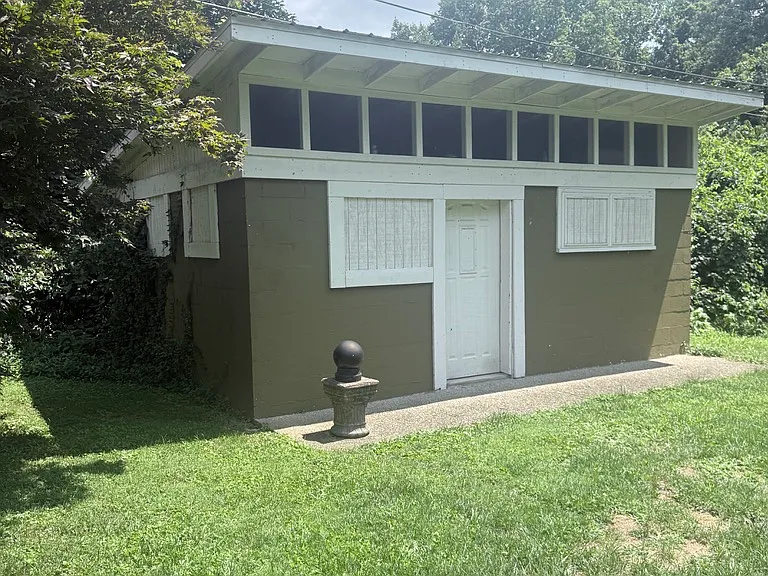 Outbuilding on the property for bike storage.