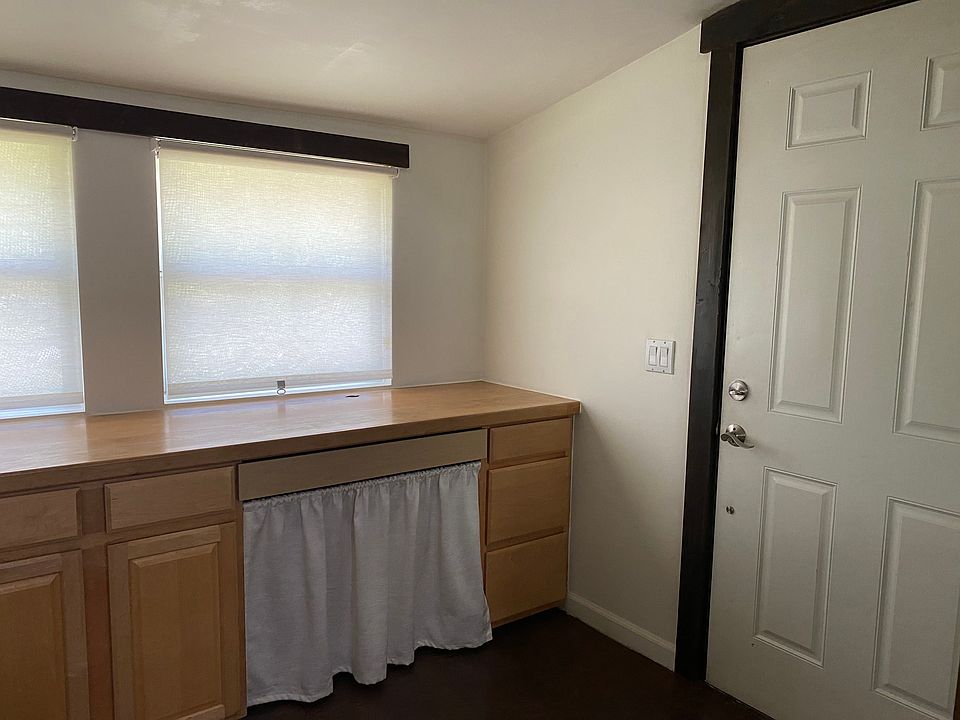Front entrance and built in desk an d storage