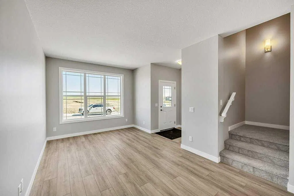 Main Floor - 143 Amblefield Avenue NW — Photo 2