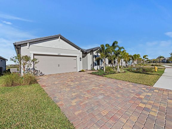 Inviting Prosperity Exterior with Impact Glass