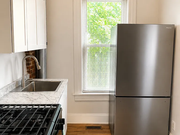 New kitchen with new stainless steel appliances.