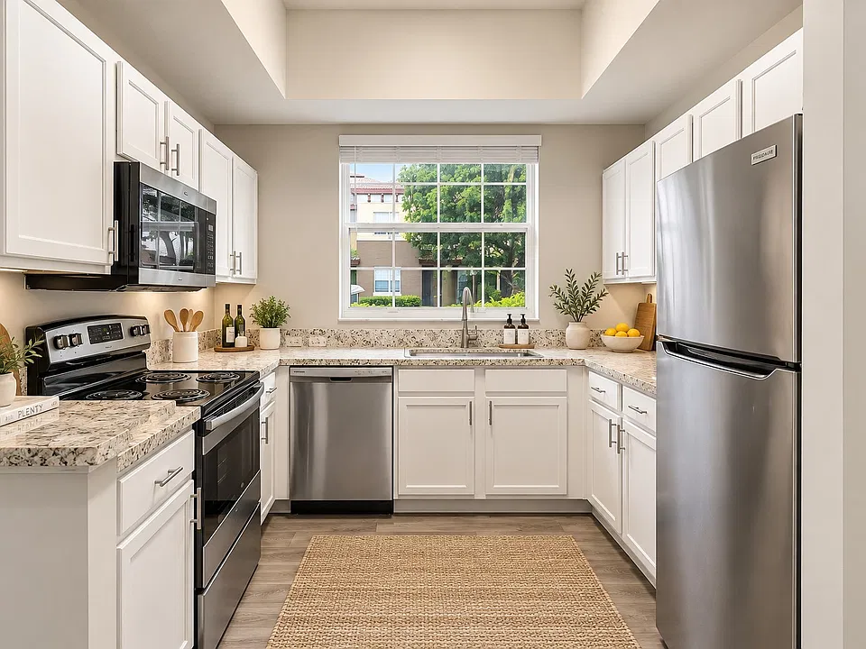 Embrace modern living at Delray Bay with a spacious and stylish kitchen featuring sleek appliances and beautiful countertops. Perfect for culinary adventures or casual dining. See how this space can elevate your lifestyleschedule a tour today!