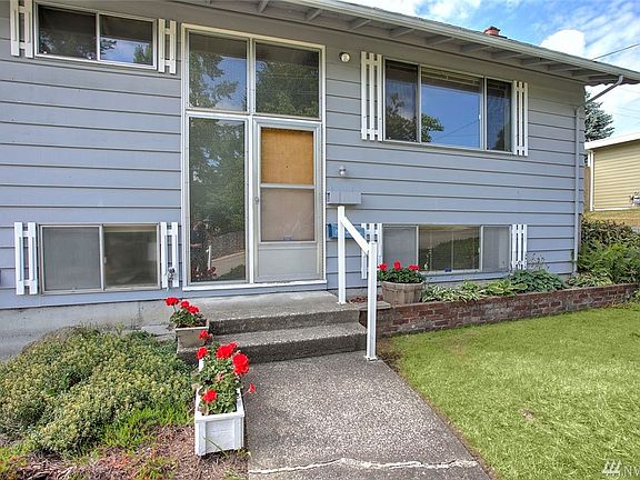 This home has sweet curb appeal. NEWLY UPDATED! 30-year composition roof with warranty provided to buyer, new electrical panel, garbage disposal, garage door opener, vinyl in kitchen, freshly painted! 