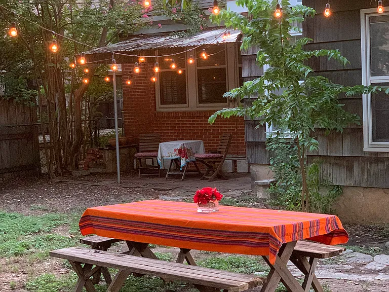 backyard with picnic table included