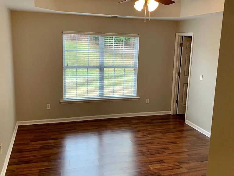 Master Bedroom with ceiling fan and vaulted ceiling....