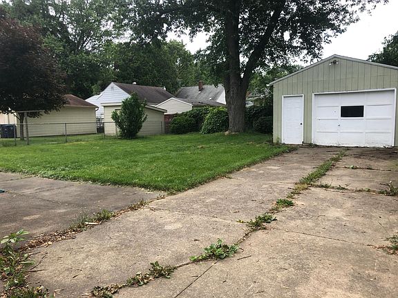 Backyard and 1 car garage with opener