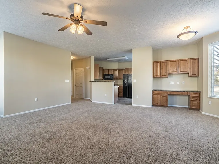 In our 2-bed Verona, from the moment you walk in, you're greeted with an open layout, built-in desk space, and a kitchen that flows right into your main living area.