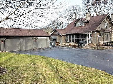 Three-car detached garage and one-car integral garage - great for additional storage.