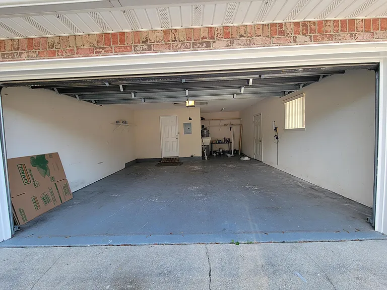 Two car garage with extra space (meant for a golf cart)