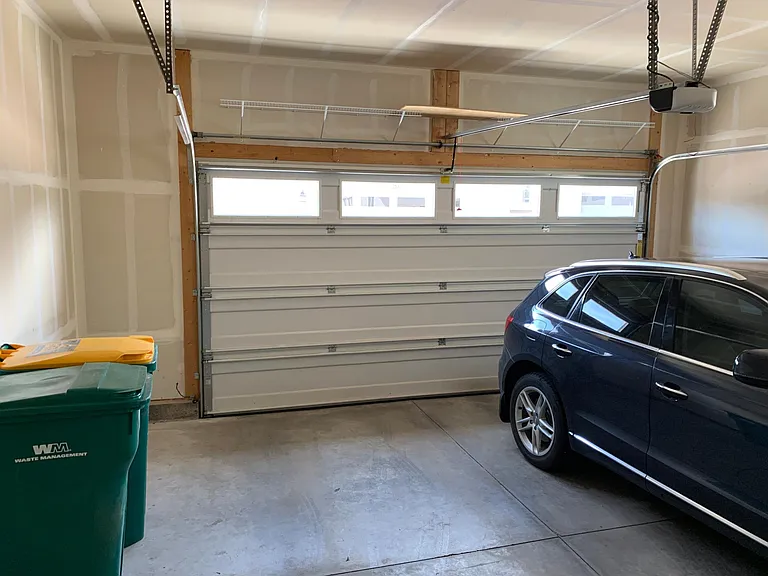 Two Car Garage, trash & recycle pick up once a week (included in rent)