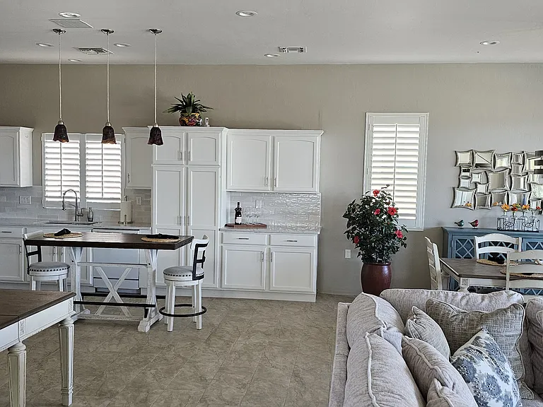Living room with attached kitchen and dinning room