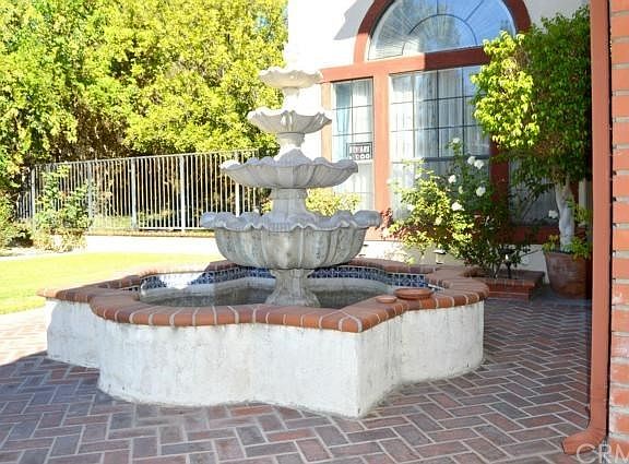 Serene fountain greets your guests.