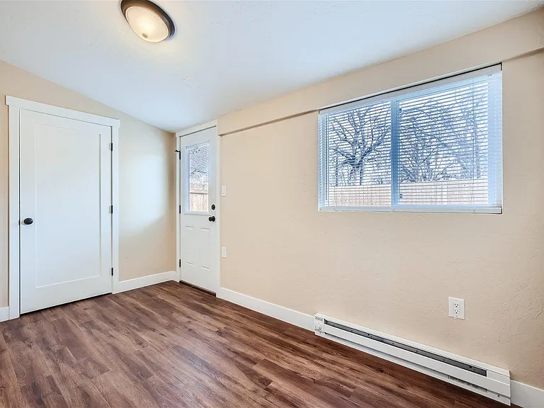 Mudroom/Multifunction Space; Door leading to laundry room
