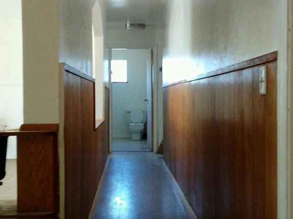 hallway to 3 bedroom and bathroom