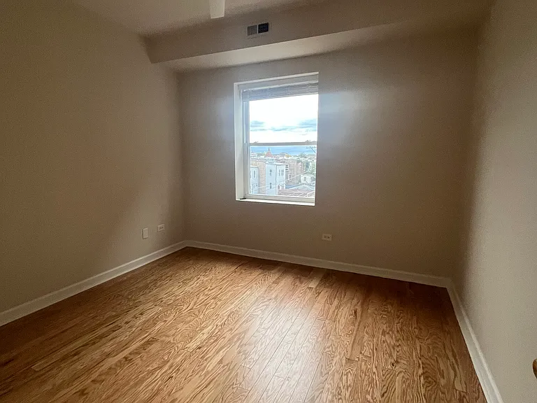 Your bedroom. Brand new flooring, paint and ceiling fan with light