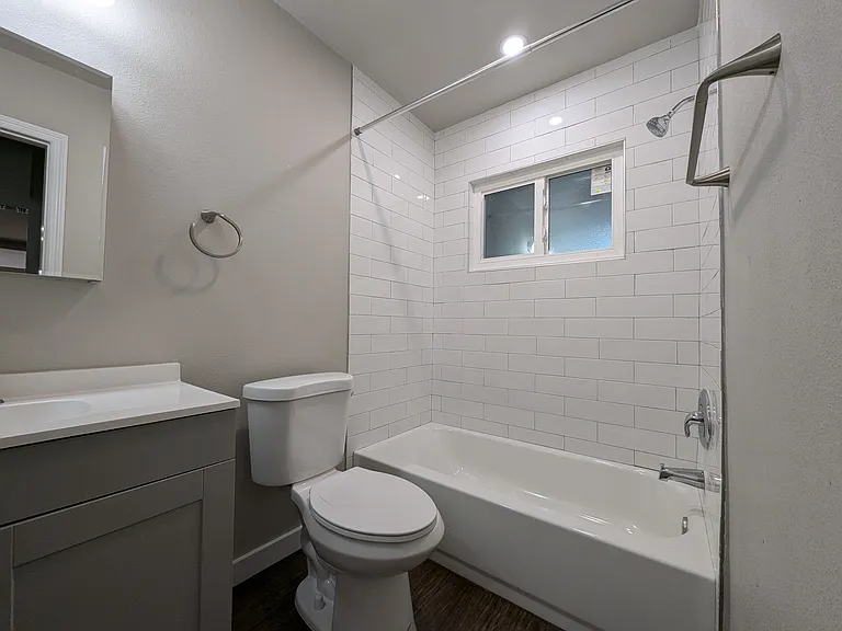 Modern bathroom with privacy glass window