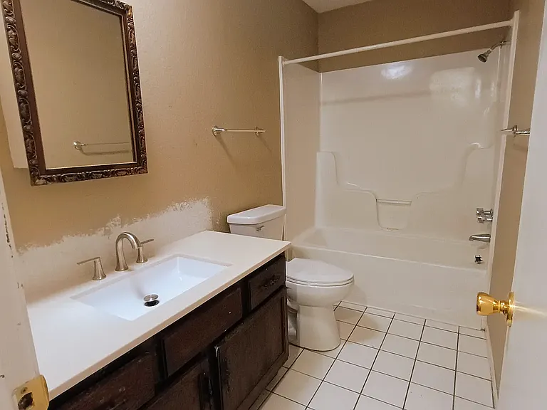 Bathroom will be painted and new large flat mirror installed.