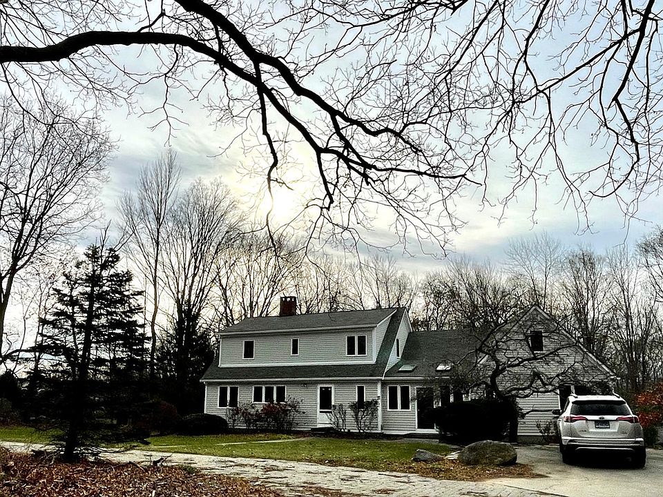 The in-law unit is located on the right side of the house.
