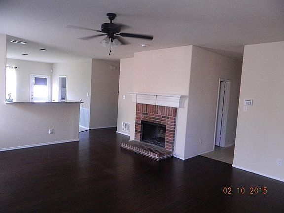 Large family room with wood burning fireplace