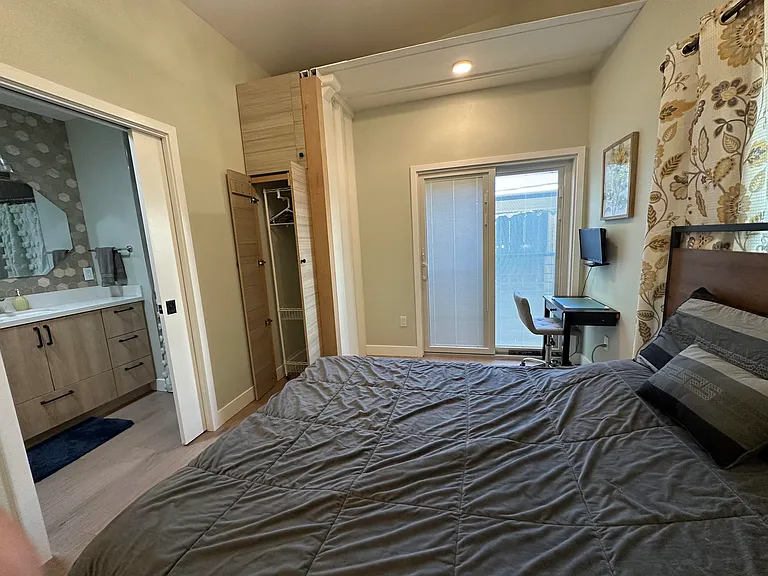 Bedroom #1, with view of closet and into Bathroom #1
