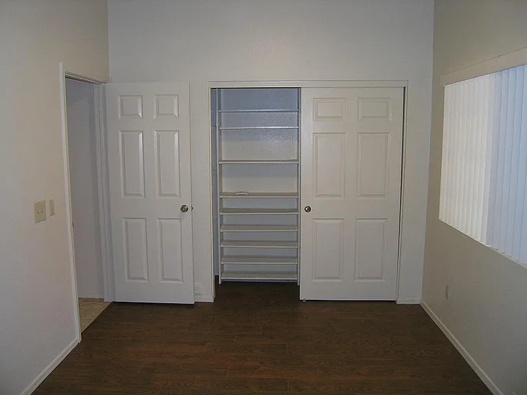 Den with storage shelves