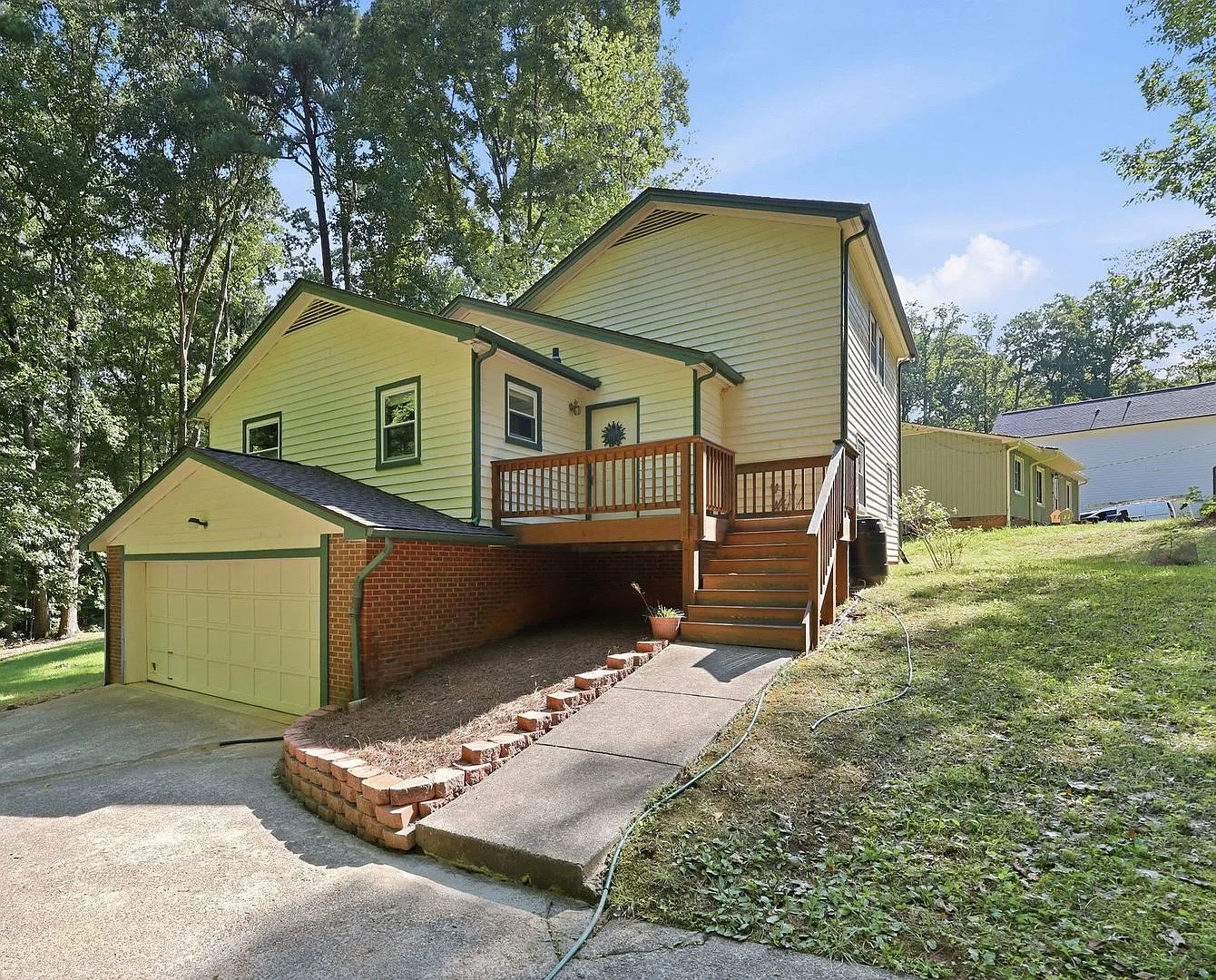 Wooded Retreat with Acreage, Two-Car Garage & Google Fiber. 4- 12 month lease option! — Photo 1