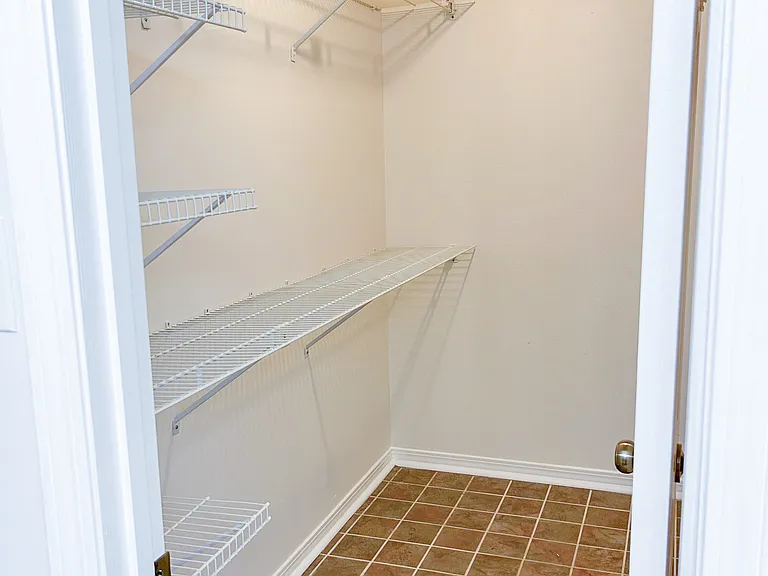 Primary Bedroom Walk-in Closet