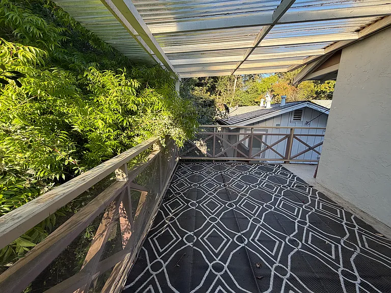 This is the spacious patio as viewed from near the upstairs bedroom door.