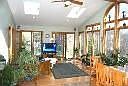 Sunroom with 4 skylights with hardwood floor