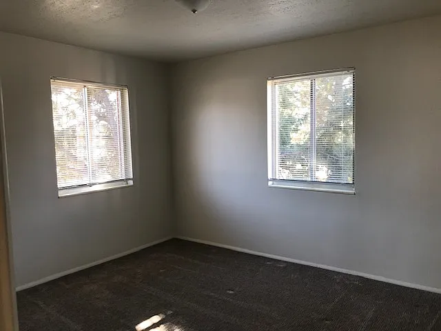 Master bedroom. So large a king sized bed seems dwarfed, Beautiful view are found again in this room. & nearby trees help to cool the room in the summer and to heat it in the winter.