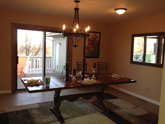 Kitchen / Dining Combo leading to two-tiered deck