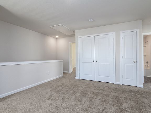 Upstairs loft, perfect for an extra living area or game room.
