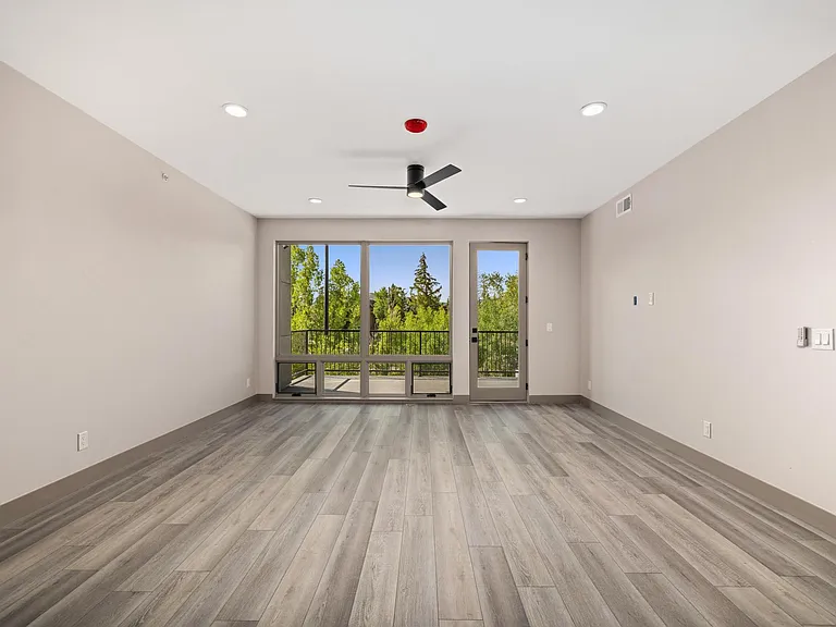 Great Room Walking out to Wall-to-Wall Balcony
