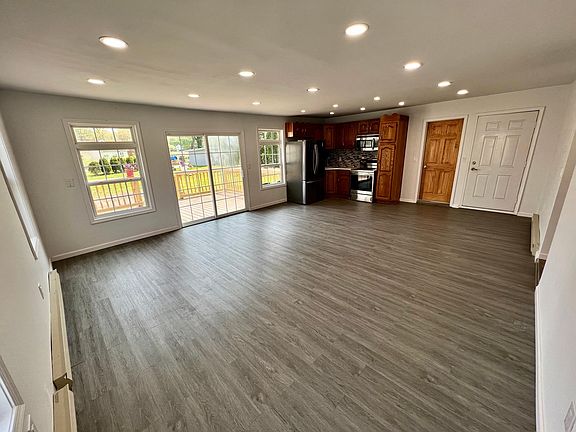 Spacious living room with open kitchen