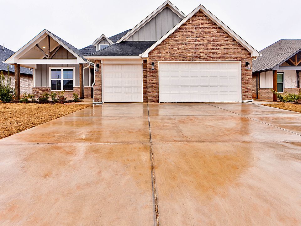 Front of Home with 3 car garage
