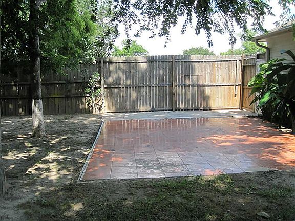large patio in backyard